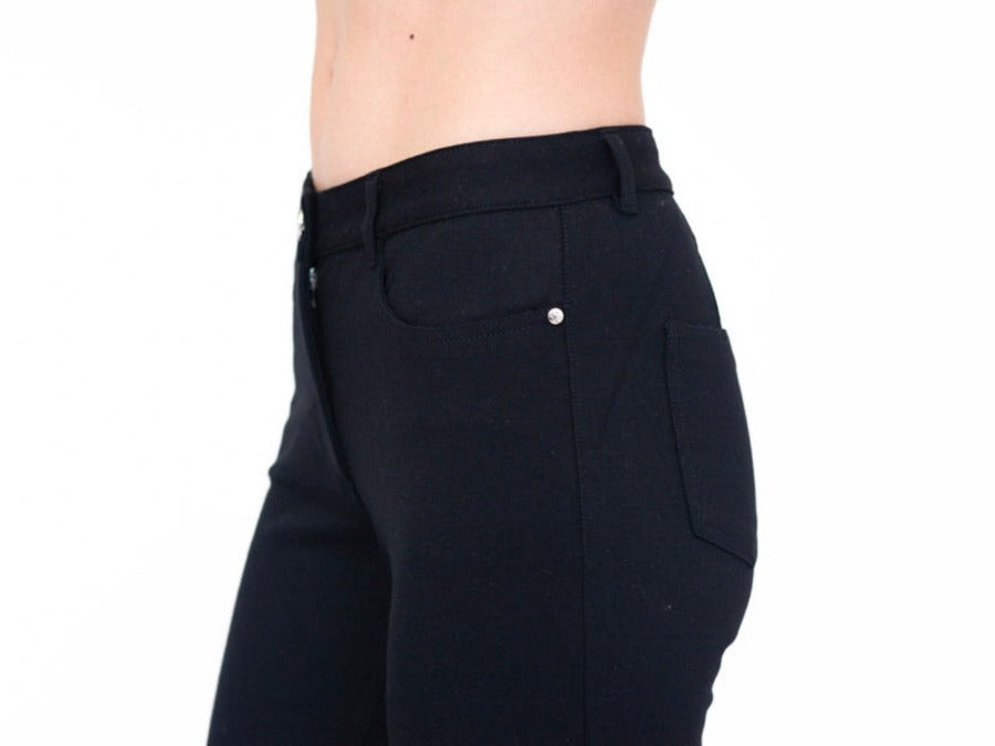 This image shows the Pocket Detail Star-Embossed Rivet, belt loops and 5-Pocket Jean Styling. The Eliza Pant is elegant, sporty, slimming and sophisticated.  Its tailored fit makes this an Ideal  pant for Work to weekend and everything in between.