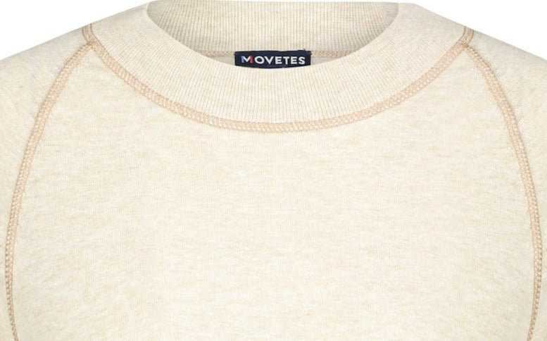 Up-Close View showing the fine jersey yarn with contrast tonal stitching and classic crewneck rib collar. Embrace Movement and Restoration with Delightfully soft , ultra fine gauge Organic Cotton Yarn.