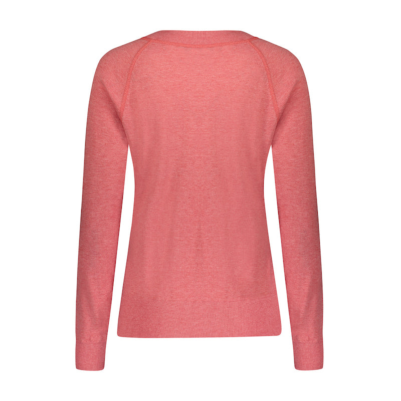 Product photography showing the pastel red Restore Organic Cotton Fine Gauge Crewneck. Luxuriously soft and delicate, this timeless style will have you reaching for it time after time. 