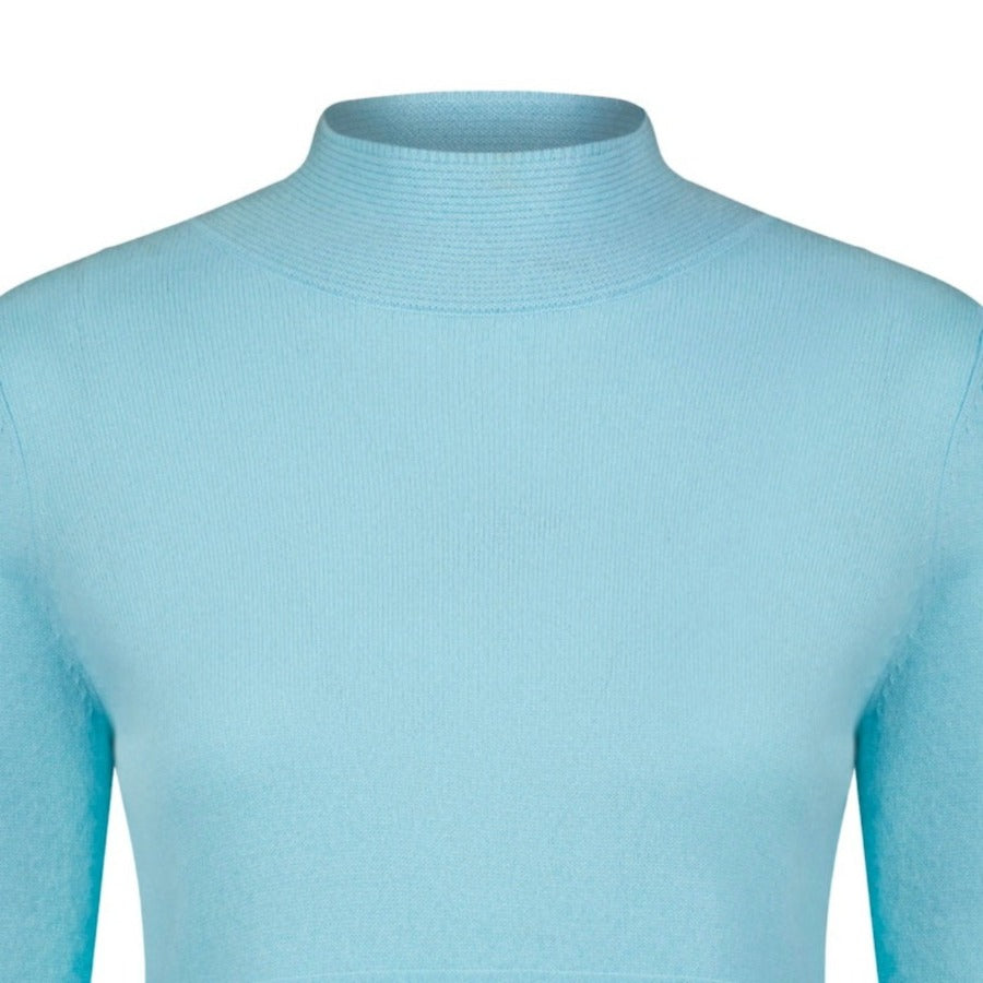 Up-Close Product Image of the Isabella Cashmere Mock Neck Turtleneck Sweater, showing the intricate rib finishing on the collar and fully fashioned detail at the sleeves