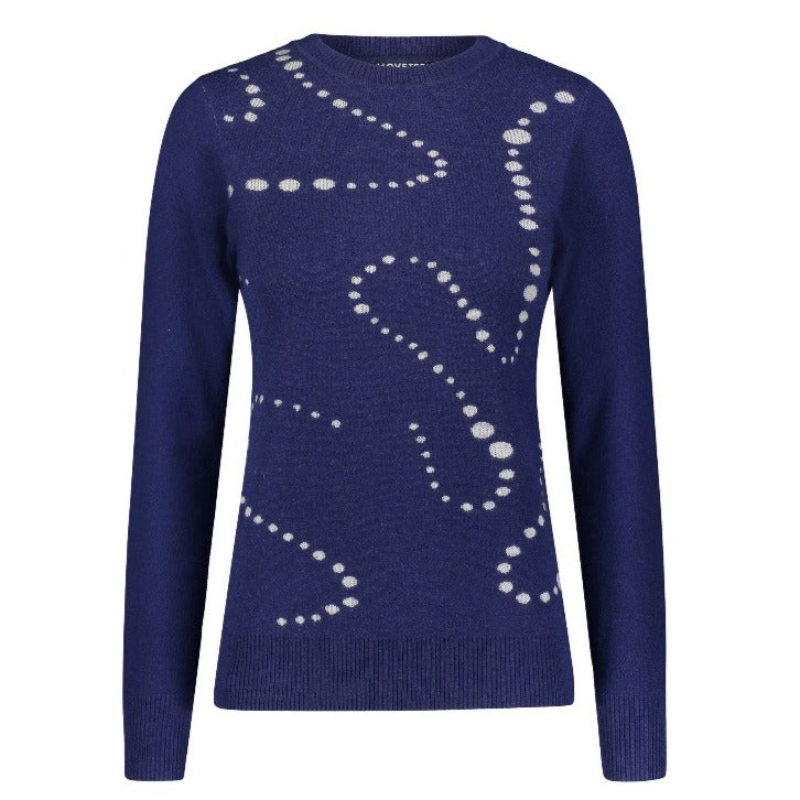 This image  shows the intarsia pattern on the front of the sweater. the Aubrey Merino-Viscose Crewneck, a luxurious and sustainable sweater made with a blend of merino wool, silk-like viscose -cellulose and cashmere. The sweater has a crew neckline The Aubrey sweater is exo-conscious and designed for active-casual luxury and all-day comfort.