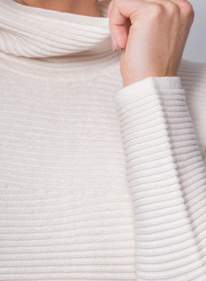 Close-up image Rib detail 100% organic cotton link stitch pullover elegant modern sweater.  Natural  Ivory Linen White Color with link rib texture stitching.